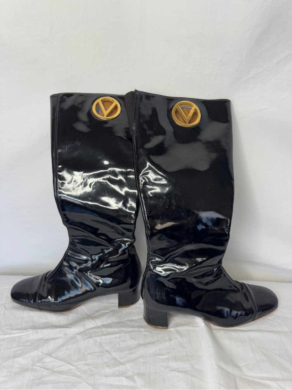 Valentino Garavani Black Patent Knee-High Boots with Gold Emblem